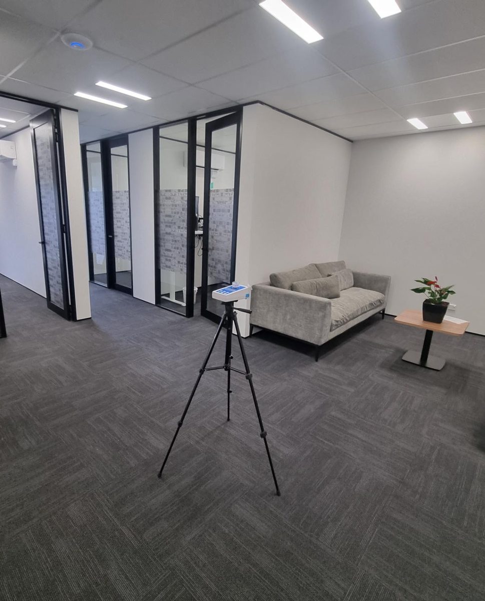 A calibrated spore trap collecting an indoor air sample in a modern New Zealand interior